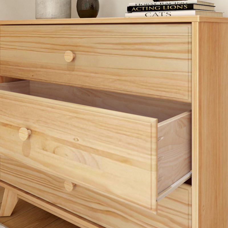 Wooden dresser with open drawer showcasing natural wood grain, ideal for home decor and storage solutions.