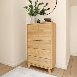 Five-drawer natural pine dresser in a minimalist bedroom corner with round mirror and decorative vase - mid-century modern tall chest for bedroom storage