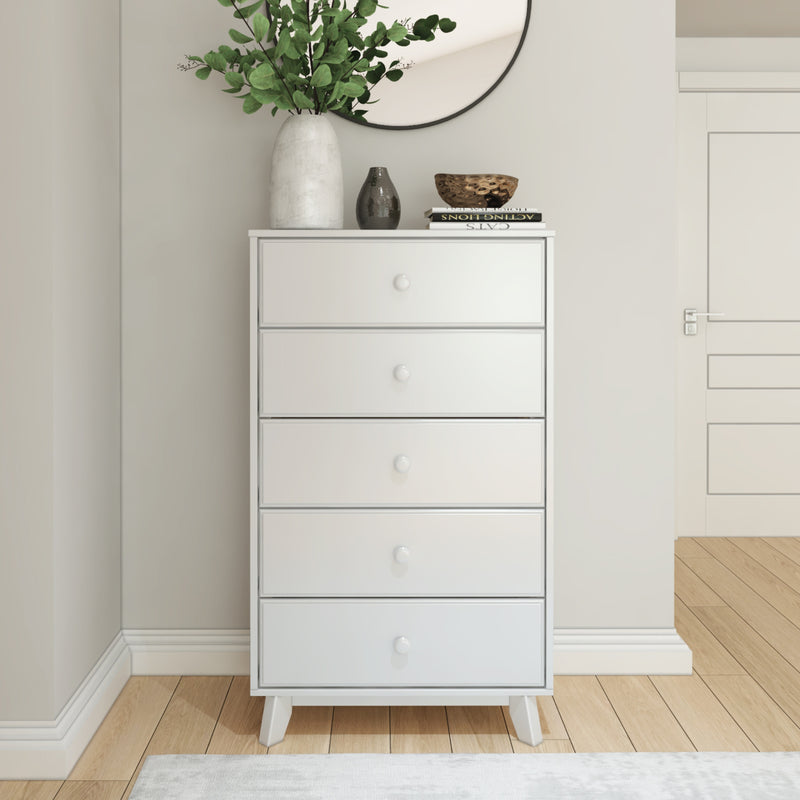Tall white dresser with plants on top, set in a modern minimalist room.