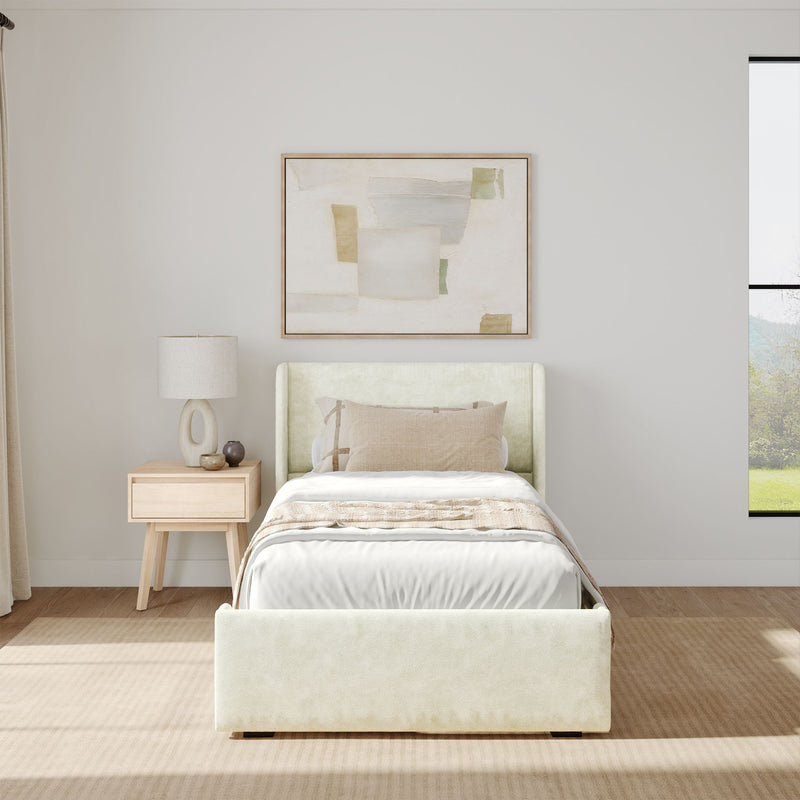 Minimalist bedroom with a modern single bed, wooden nightstand, and abstract wall art.