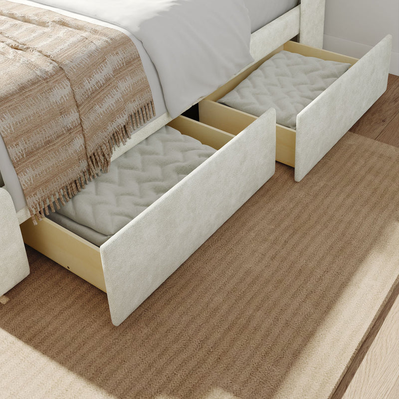 Under-bed storage drawers with blankets, enhancing bedroom organization and maximizing space.