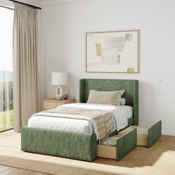 Green upholstered bed with storage drawers in a modern bedroom with minimalist decor.