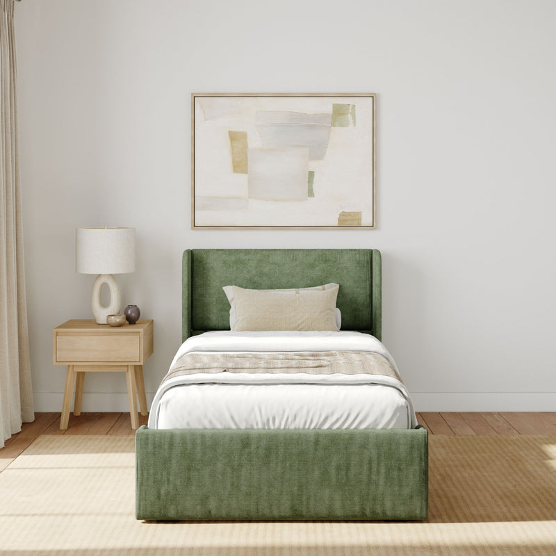 Sophisticated modern bedroom with green upholstered bed and minimalist decor.