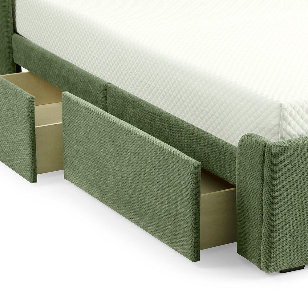 Green upholstered bed with open storage drawers beneath a white quilted mattress.