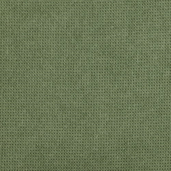 Green textured fabric background with waffle weave pattern.
