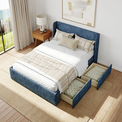 Modern blue upholstered bed with storage drawers in stylish bedroom.