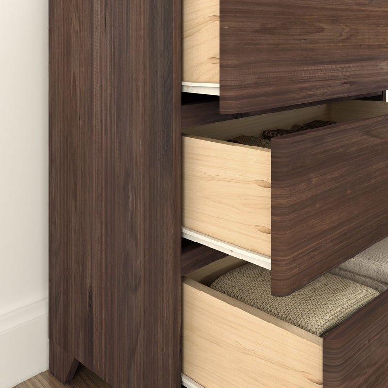 Wooden dresser with open drawers showcasing woven textiles inside.