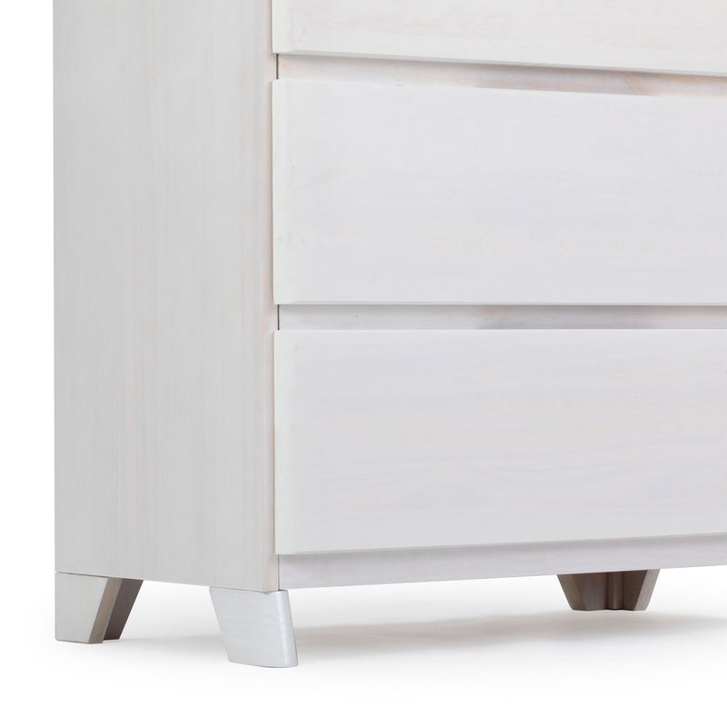 White wooden dresser with minimalist design and sturdy legs, perfect for modern bedroom storage.