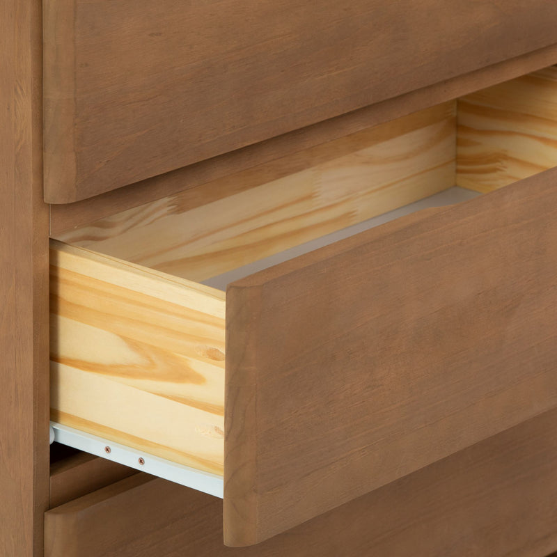 Open wooden drawer on a brown dresser showing natural grain texture.