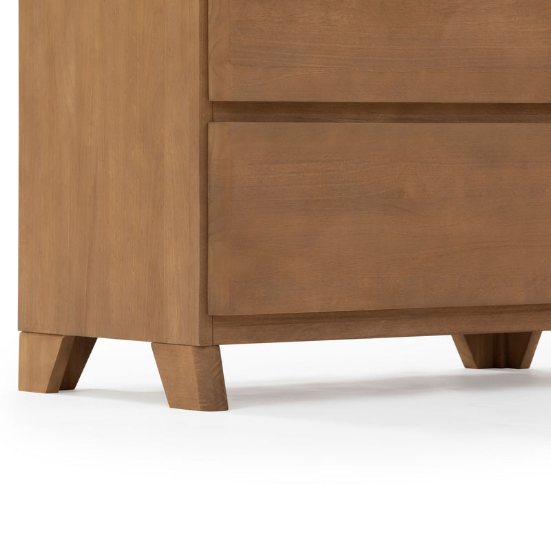 Wooden mid-century modern dresser with tapered legs and natural finish.