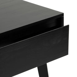Close-up view of modern black wooden table corner with sleek design.