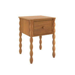 Honey oak wooden nightstand with single drawer and turned spindle legs, compact bedside table