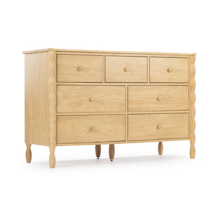 Nine-drawer light wood dresser with natural maple finish, turned legs and simple knobs — spacious bedroom storage