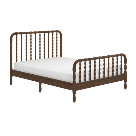 Dark walnut wooden spindle bed frame with white mattress, turned spindles and low platform for modern farmhouse bedroom