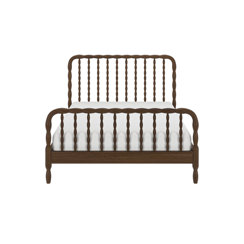 Dark walnut solid wood spindle bed frame with curved headboard and footboard and white mattress, farmhouse-style bedroom furniture