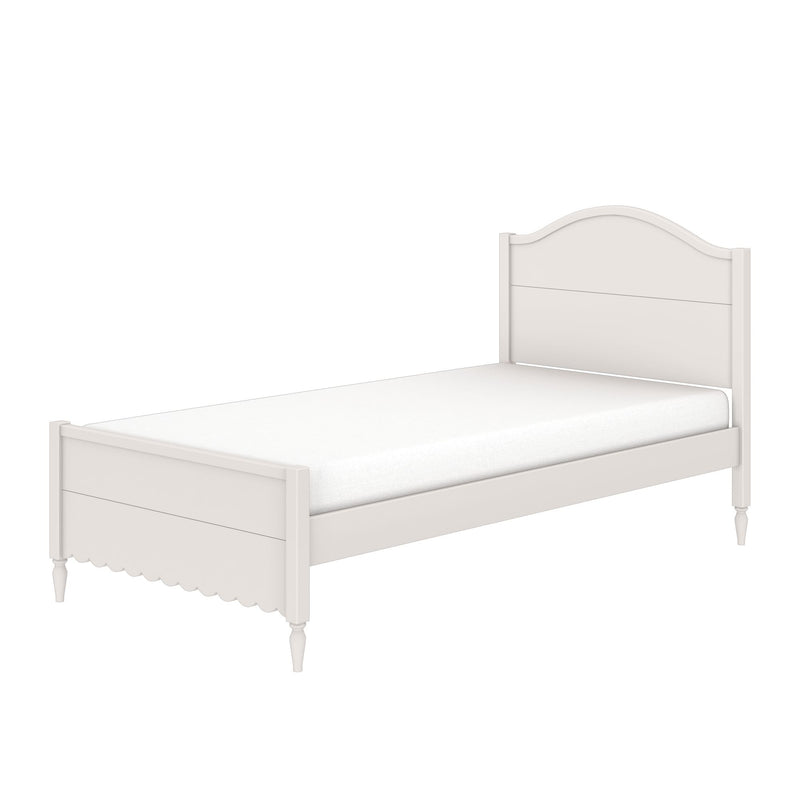 White wooden twin bed frame with arched headboard, scalloped footboard, turned legs and mattress