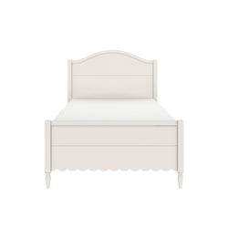 White wooden twin bed frame with arched headboard, scalloped footboard and turned legs — farmhouse-style single bed for nursery or guest room