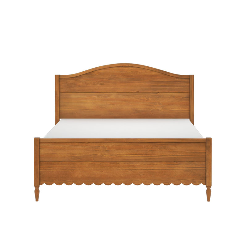 Natural solid wood bed frame with curved headboard and scalloped footboard in warm oak finish, classic bedroom furniture.