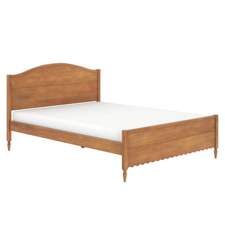 Solid wood platform bed with arched headboard, scalloped footboard and turned legs in natural oak finish with white mattress