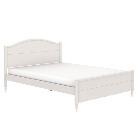 White wooden bed frame with curved headboard, scalloped footboard and turned legs with mattress, cottage-style