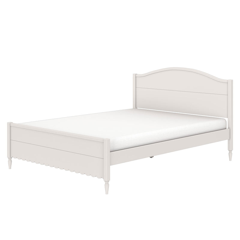 White wooden bed frame with curved headboard, scalloped footboard and turned legs with mattress, cottage-style