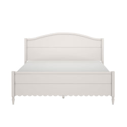 White wooden farmhouse bed frame with curved headboard, scalloped footboard and turned legs