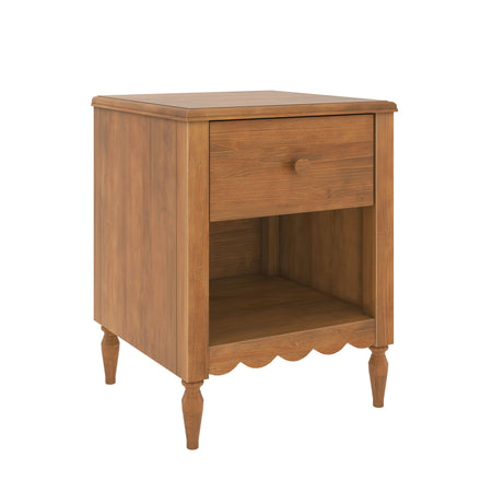 Medium brown wooden nightstand bedside table with one drawer, open shelf, turned legs and scalloped apron in a classic farmhouse style