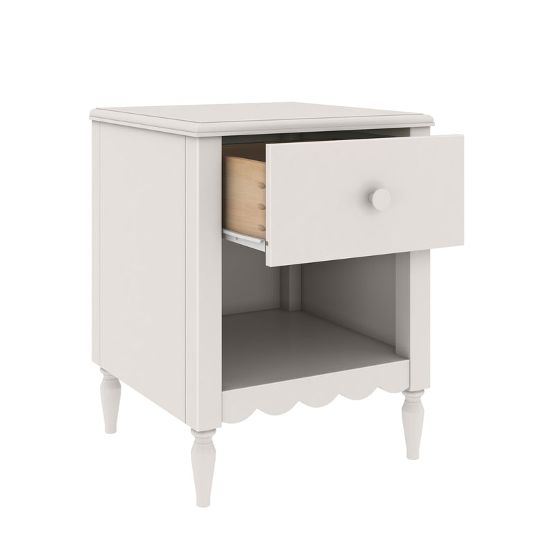 White wooden bedside nightstand with single drawer, open lower shelf, scalloped apron and turned legs, farmhouse style