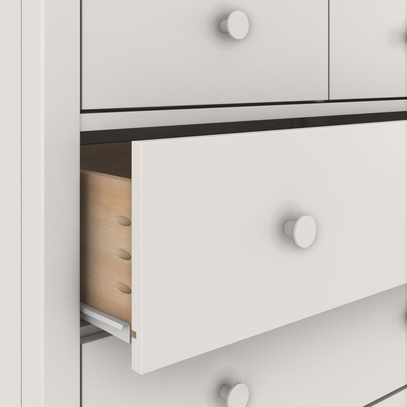 White dresser with partially open drawer showing wooden interior and metal drawer slide, modern bedroom storage chest of drawers