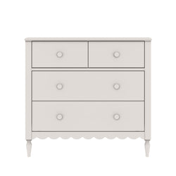 White wooden chest of drawers with two small top drawers and two large lower drawers, turned legs and scalloped apron, farmhouse-style nursery dresser