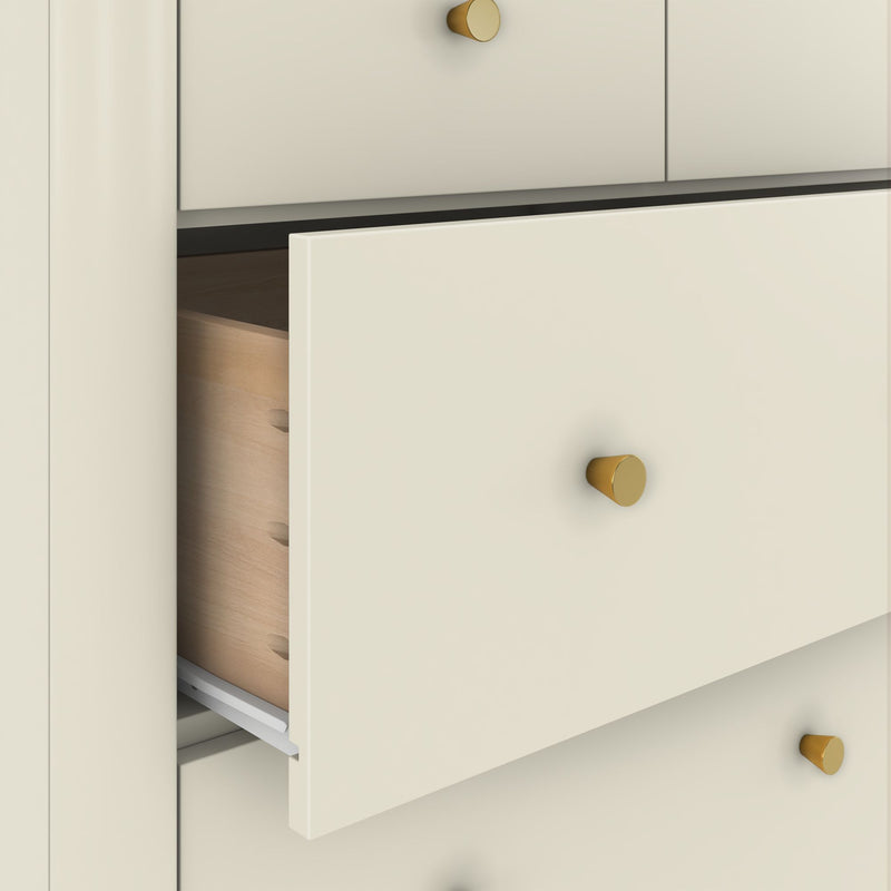 Close-up of cream modern dresser with partially open drawers, gold cone knobs, exposed wooden drawer interior and metal glide — bedroom storage furniture