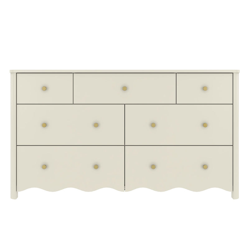 Cream six-drawer painted dresser with round brass knobs and scalloped base, bedroom storage chest