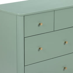 Mint green painted dresser with brass cone knobs, modern chest of drawers close-up