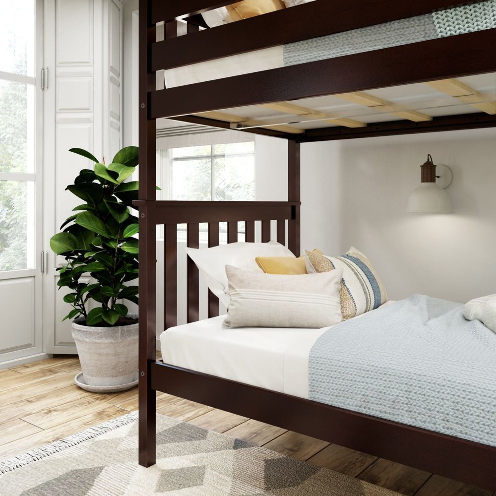 Bunk bed with wooden frame and cozy bedding in modern bedroom with natural light.