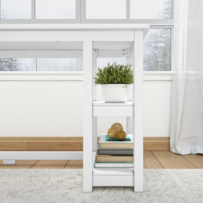White desk with built-in shelf featuring a potted plant, decor items, and books in a bright minimalist room.