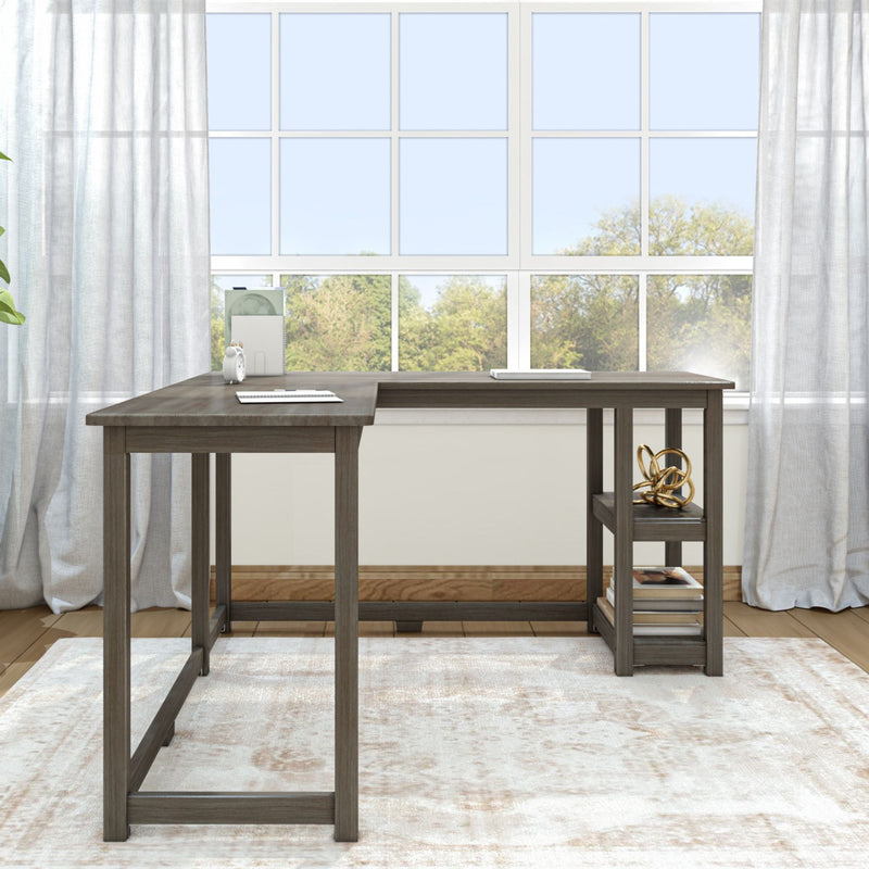 Modern home office furniture setup with L-shaped desk near large window.