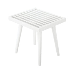 White slatted wooden side table with four legs, modern minimalist design.