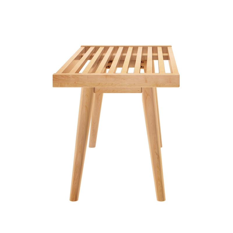 Contemporary slatted wooden coffee table with four legs in natural finish.