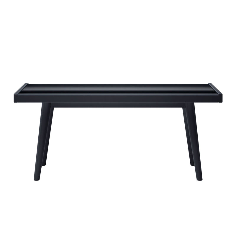 Minimalist black wooden bench with slatted seat design for modern interior decor.