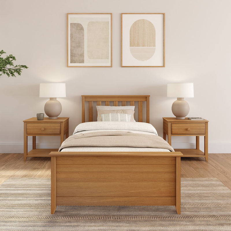 Contemporary bedroom with wooden bed frame, matching nightstands, and modern decor.