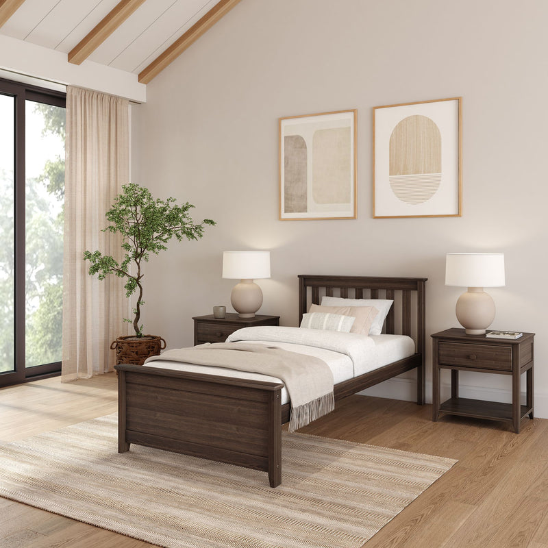 Modern minimalist bedroom with dark wood twin bed, matching nightstands, neutral bedding, table lamps, abstract wall art, and potted indoor plant