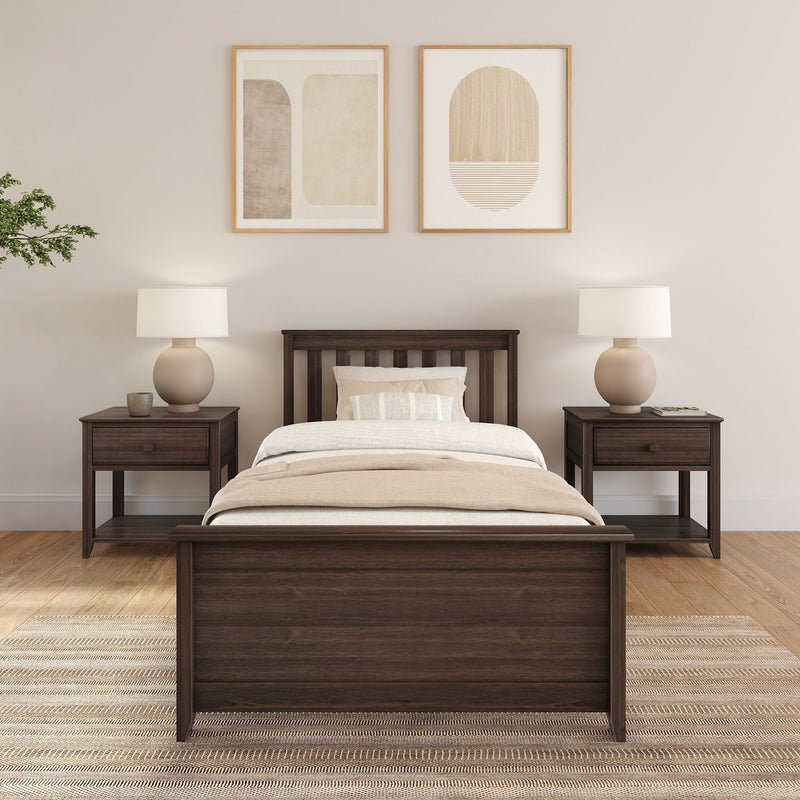 Minimalist modern Scandinavian bedroom with dark wood bed frame and matching nightstands, neutral beige bedding, ceramic table lamps and abstract wall art
