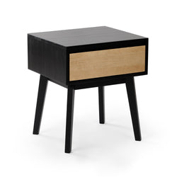 Modern black and wood nightstand with single drawer and angled legs.