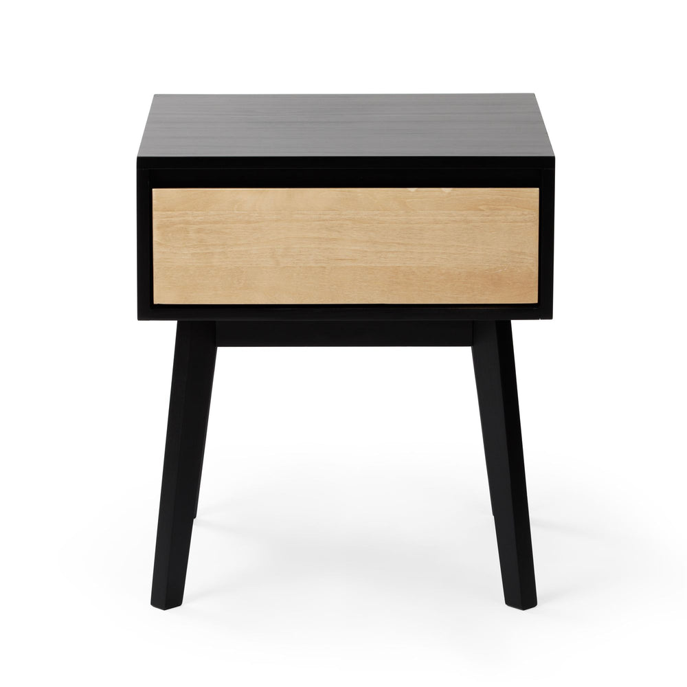 Mid-century modern nightstand with wooden drawer and black legs.