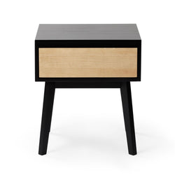 Mid-century modern nightstand with wooden drawer and black legs.