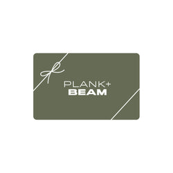 Plank + Beam gift card, olive-green rectangle with rounded corners, white logo and diagonal ribbon with bow
