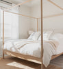 Video of multiple bedrooms and living rooms with light, airy summer theme.