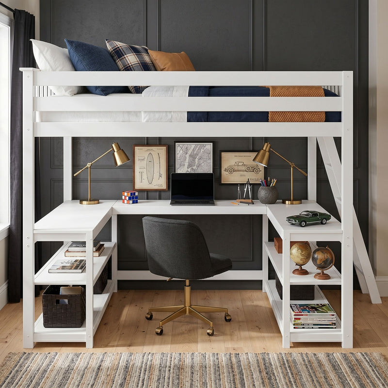White wooden loft bed with integrated L-shaped desk and shelving, navy bedding and plaid pillows, brass desk lamps, laptop, globes and model car — modern space-saving kids' bedroom workstation