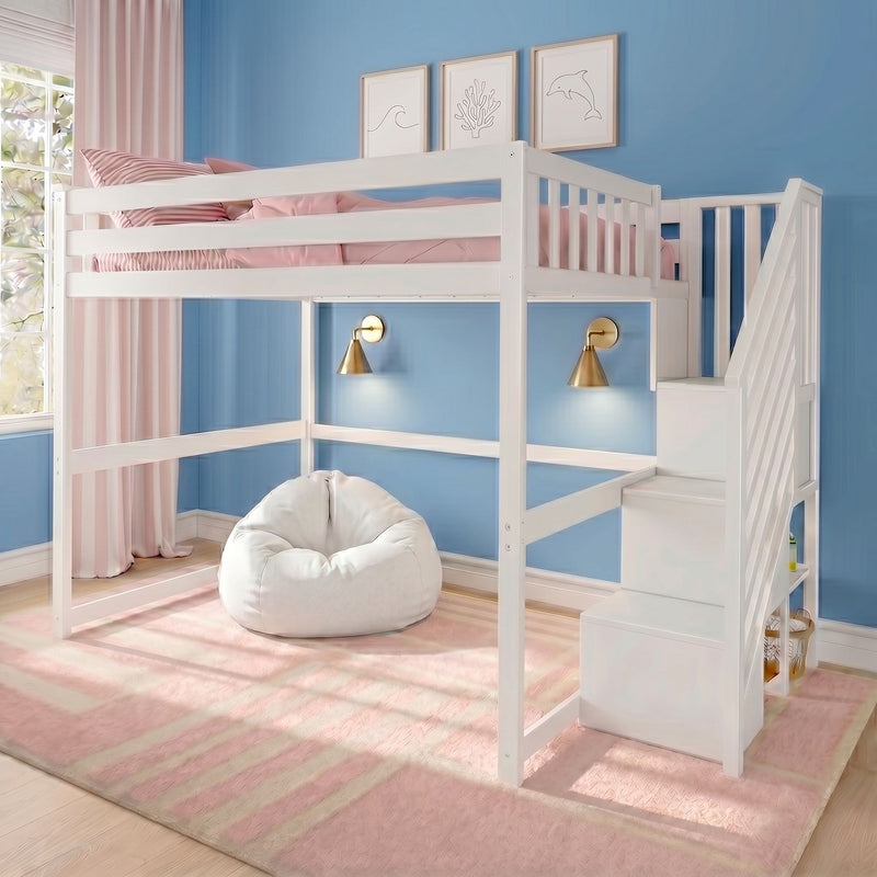 White kids loft bunk bed with built-in staircase and storage, pink bedding and striped curtains against a blue wall, white bean bag and brass wall sconces