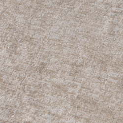 Beige textured carpet close-up with subtle linear pattern — neutral rug and upholstery fabric for modern living room decor